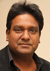 Amjad Khan - Executive Director